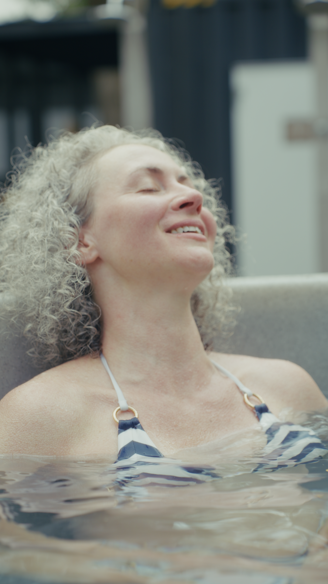 Guests relaxing together inside a Plugin Heat Club sauna
